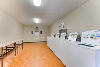 Row of washers and dryers
